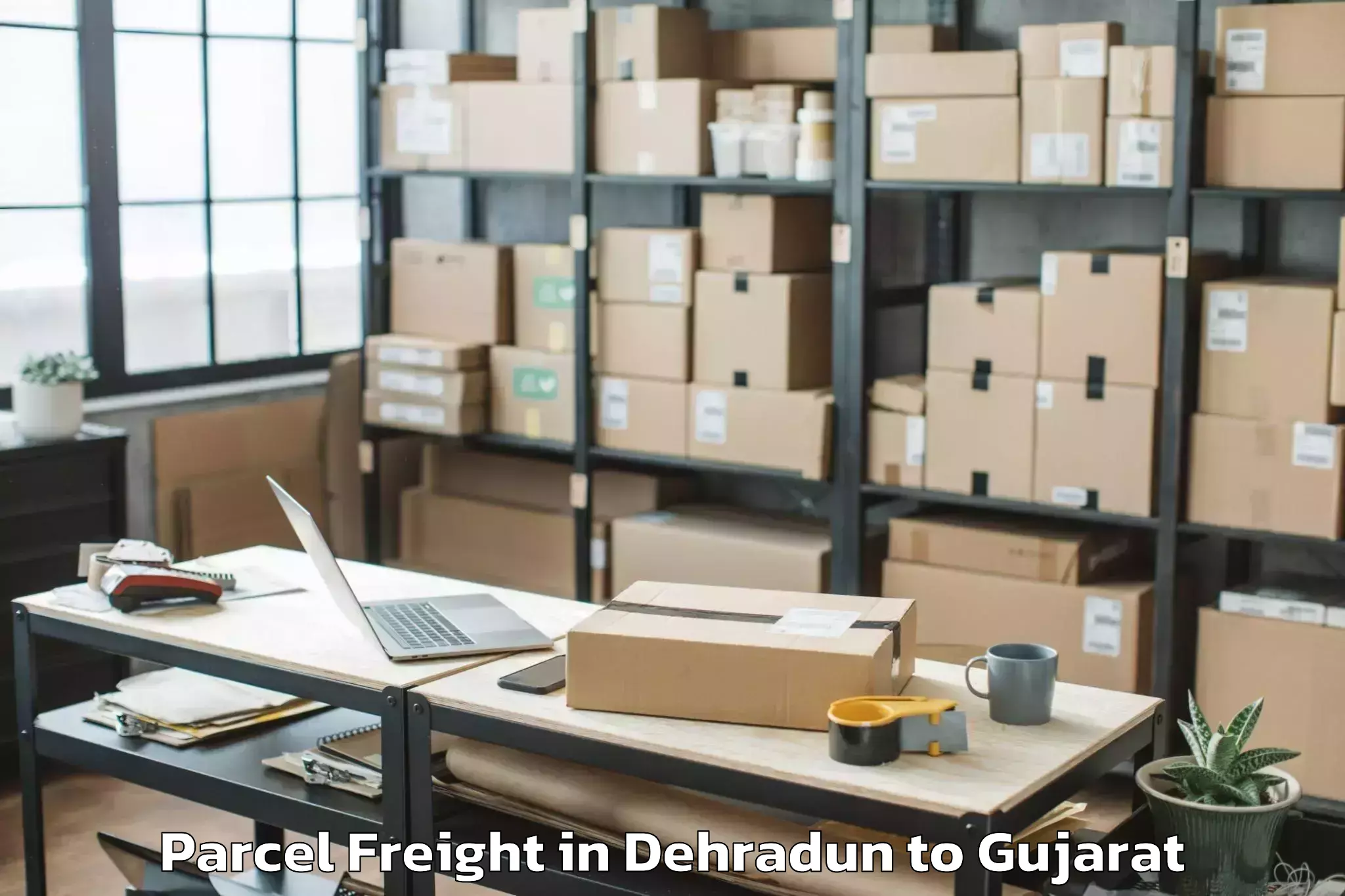 Hassle-Free Dehradun to Baria Parcel Freight